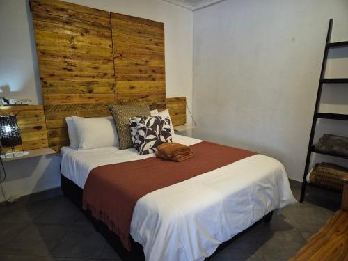 Postel nebo postele na pokoji v ubytování Feather Rest