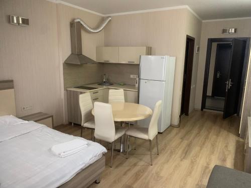 Ein Bett oder Betten in einem Zimmer der Unterkunft ORBI First Line APARTHOTEL