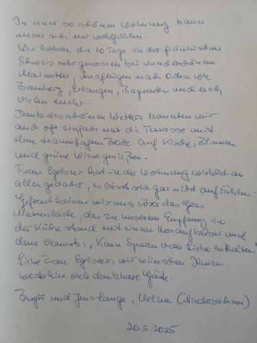a letter from person to person at Appartment Schlossblick in Wiesenthau