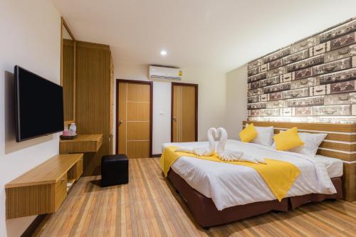Katil atau katil-katil dalam bilik di Tee Pak Dee Resident Phuket