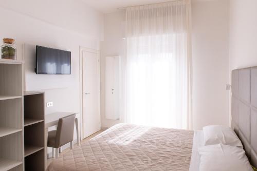 TV a/nebo společenská místnost v ubytování Hotel Silver