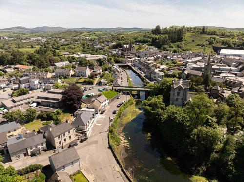 an aerial view of a town with a river at The Old Schoolhouse - Teacher's Quarters in Donegal