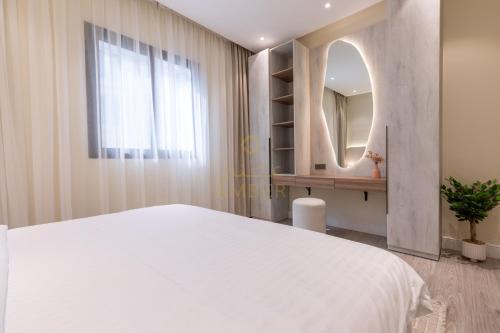 Postel nebo postele na pokoji v ubytování Amber Hospitality - Al Qairawan