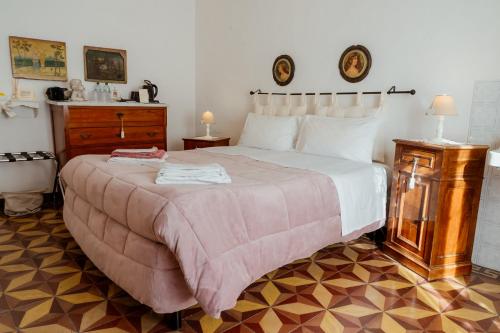 Ένα ή περισσότερα κρεβάτια σε δωμάτιο στο B&B La Casa di Fano