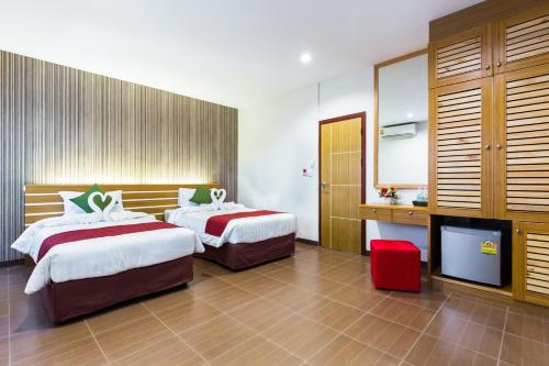 Katil atau katil-katil dalam bilik di Tee Pak Dee Resident Phuket