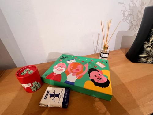 a book sitting on top of a wooden table at Apartamento Pigem a paso de la playa en Salou in Salou