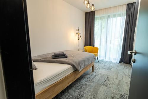 Ένα ή περισσότερα κρεβάτια σε δωμάτιο στο Lima Apartment - Free Parking, Near City Center