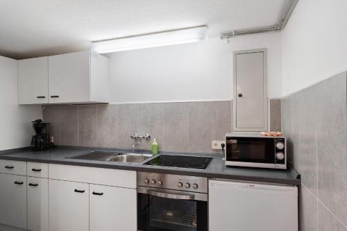 Η κουζίνα ή μικρή κουζίνα στο Ferienwohnung Aschoff