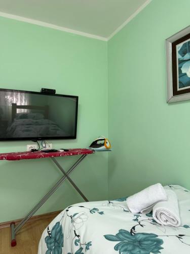 TV a/nebo společenská místnost v ubytování Sweet Escape