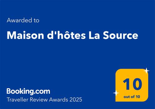 a yellow square with the words mission huts la source on it at Maison d'hôtes La Source in Magny-les-Hameaux