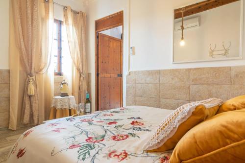 Una cama o camas en una habitación de Can Potdir