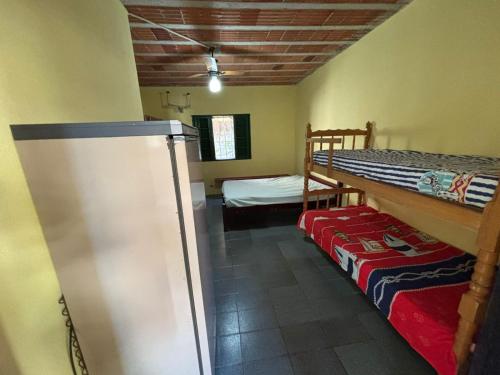 Postel nebo postele na pokoji v ubytování Pousada Duas irmãs