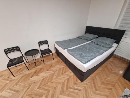 Katil atau katil-katil dalam bilik di Apartman Mihajlovic
