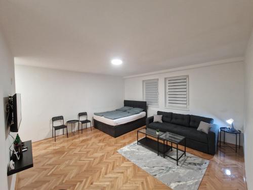 Katil atau katil-katil dalam bilik di Apartman Mihajlovic