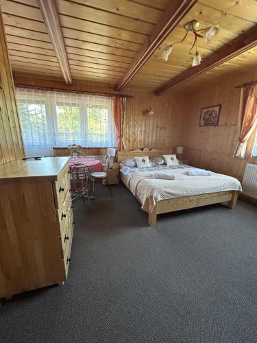 Postel nebo postele na pokoji v ubytování POKOJE GOŚCINNE U ANIELI Szczyrk Biały Krzyż