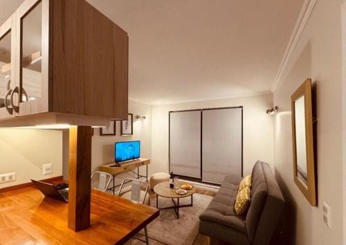 TV a/nebo společenská místnost v ubytování Condominio Nuevo Parque Suizo