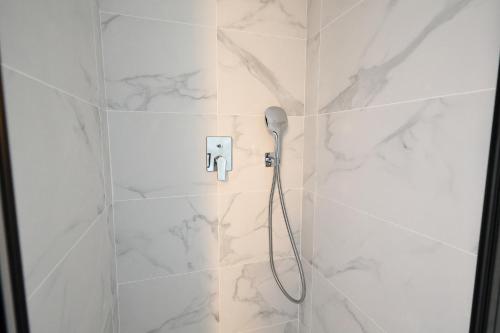 Et badeværelse på L'Envol - T3 vue mer avec piscine et plage privée