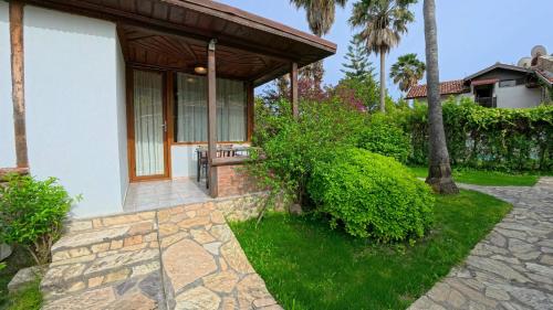 Un jardín fuera de Dalyan YUNUS HOTEL