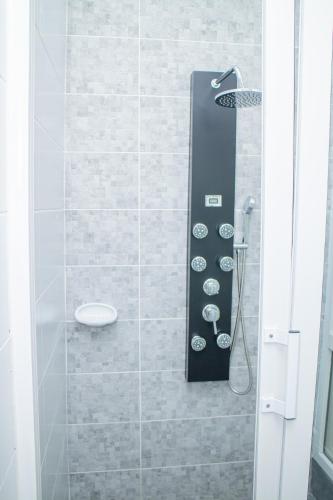 Vannituba majutusasutuses Appartements meublés mpita