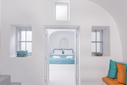 Cama ou camas em um quarto em Horizon Aeifos Suites