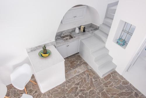 A cozinha ou cozinha compacta de Horizon Aeifos Suites