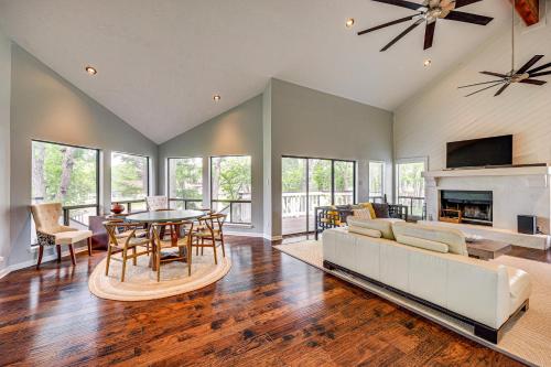 a large living room with a couch and a table at Waterfront Seguin Lake House Near Downtown in Seguin