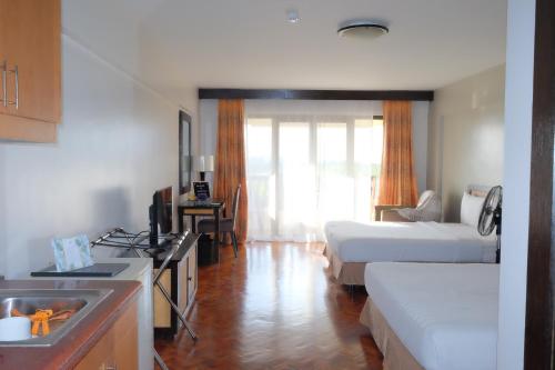 Postel nebo postele na pokoji v ubytování Boracay Malay Aklan Studio Unit