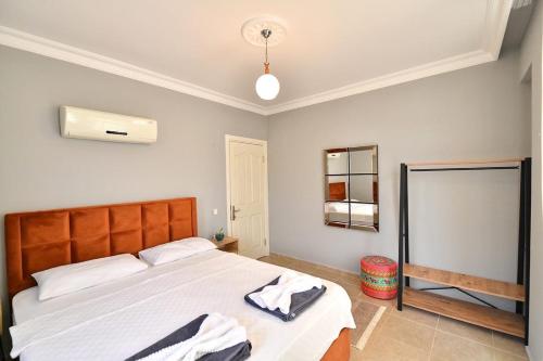 Postel nebo postele na pokoji v ubytování villa almond