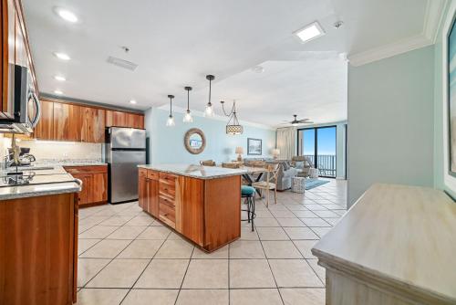 an open kitchen with a dining and living room at Phoenix X Unit 803 in Orange Beach