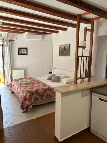 a bedroom with a bed in a room at Apartments Marina in Vrsar