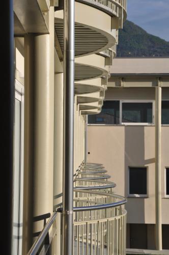 a row of balconies on the side of a building at Hotel Vischi in Domaso