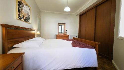 Postel nebo postele na pokoji v ubytování Amorosa Beach Apartment Family