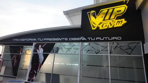 a sign on the side of a building at Hotel Vip La Guaira in Macuto