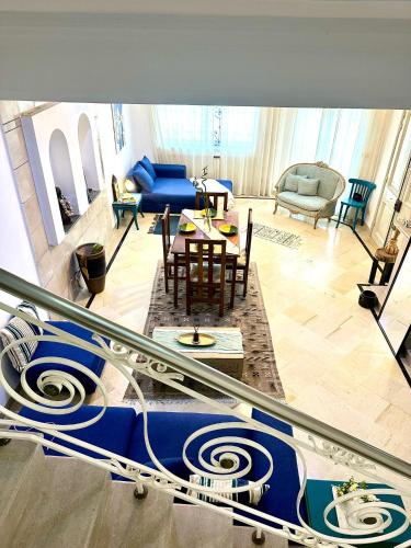 Un lugar para sentarse en Duplex avec jardin a Sidi Bousaid