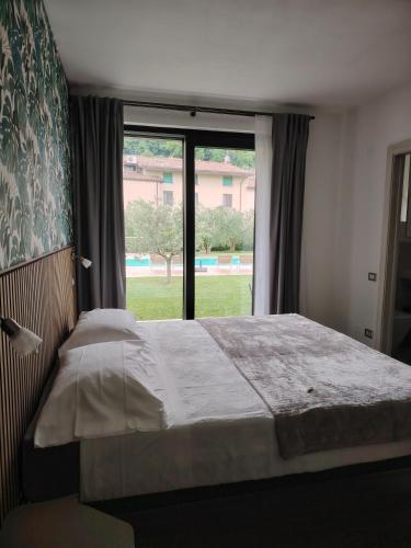 Katil atau katil-katil dalam bilik di B&B El Rocol
