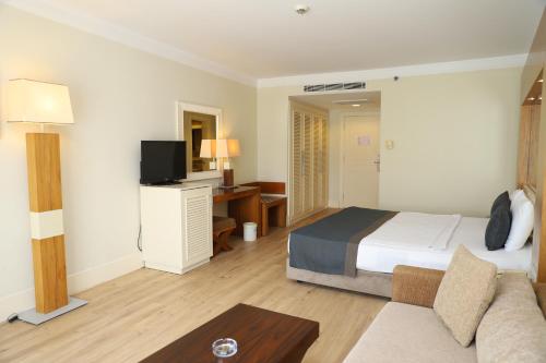 Postel nebo postele na pokoji v ubytování Meder Resort Hotel - Ultra All Inclusive