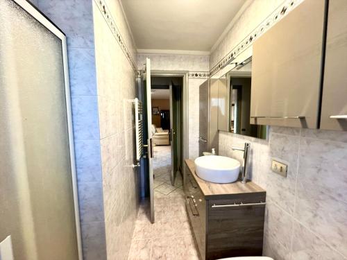 a bathroom with a sink and a toilet at Villa Maria Grazia in Lucca