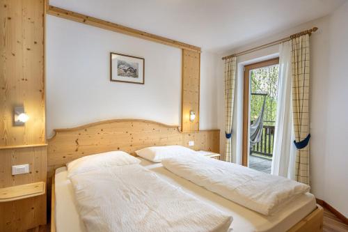 Ένα ή περισσότερα κρεβάτια σε δωμάτιο στο Apartments Ciancel Gino