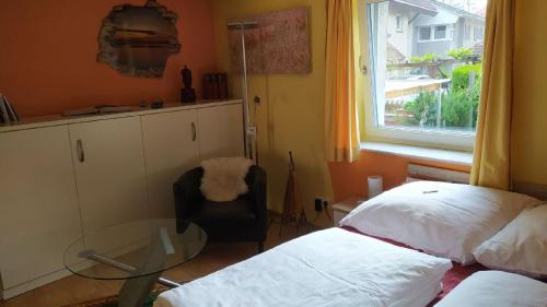 Postel nebo postele na pokoji v ubytování Ferienwohnung Kapellenwinkel, 19qm