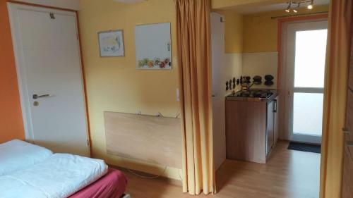 Postel nebo postele na pokoji v ubytování Ferienwohnung Kapellenwinkel, 19qm