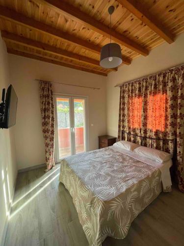 Ένα ή περισσότερα κρεβάτια σε δωμάτιο στο Sunrise apartment