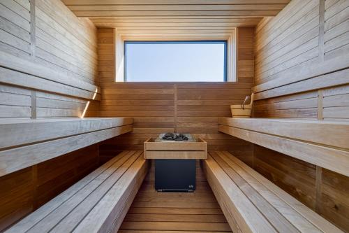 a sauna with a sink and a window at Level 5 Rovinj - Adults Only in Rovinj