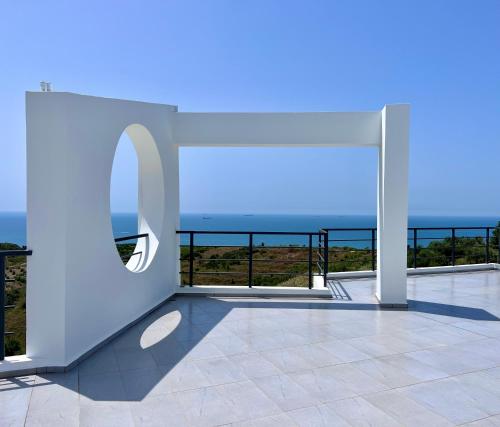 a room with a view of the ocean at Villa Esmi Durres in Kryemëdhenji