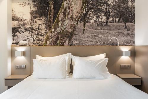 Postel nebo postele na pokoji v ubytování Serra d'Aire Boutique Hotel - SA Hotels