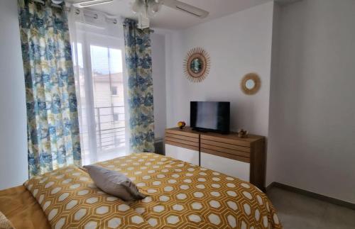 Ένα ή περισσότερα κρεβάτια σε δωμάτιο στο Residence Azur Cavalaire
