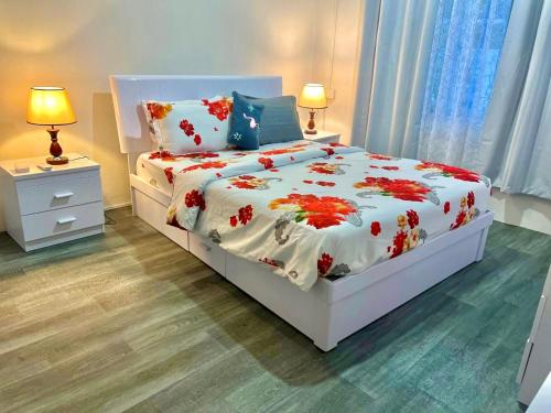 Postel nebo postele na pokoji v ubytování Hudhuveli Residence