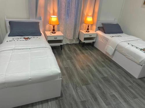 Postel nebo postele na pokoji v ubytování Hudhuveli Residence