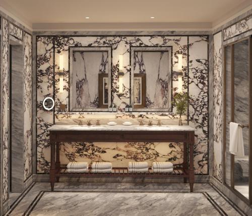 a bathroom with a sink and two mirrors at Villa San Michele, A Belmond Hotel, Florence in Fiesole