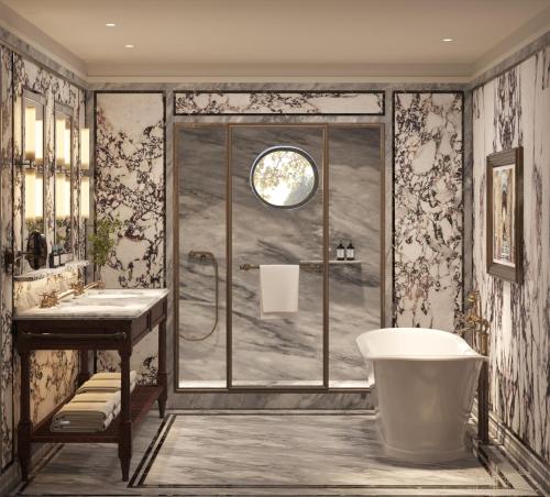 a bathroom with a window and a tub and a sink at Villa San Michele, A Belmond Hotel, Florence in Fiesole