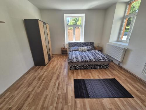 Postel nebo postele na pokoji v ubytování Apartmán pro 4 osoby, Vejprty